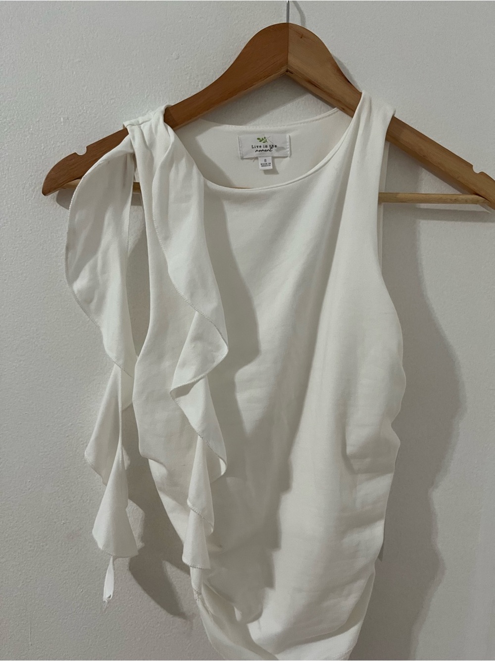 Cream One-Shoulder Ruffle Blouse by Livie & Luca